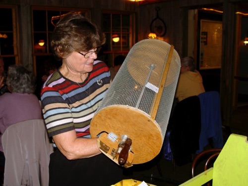 2005-11-15 Norma shaking the Raffle Drawing tickets at Barnsider, Sugar Loaf. DSC00584.jpg